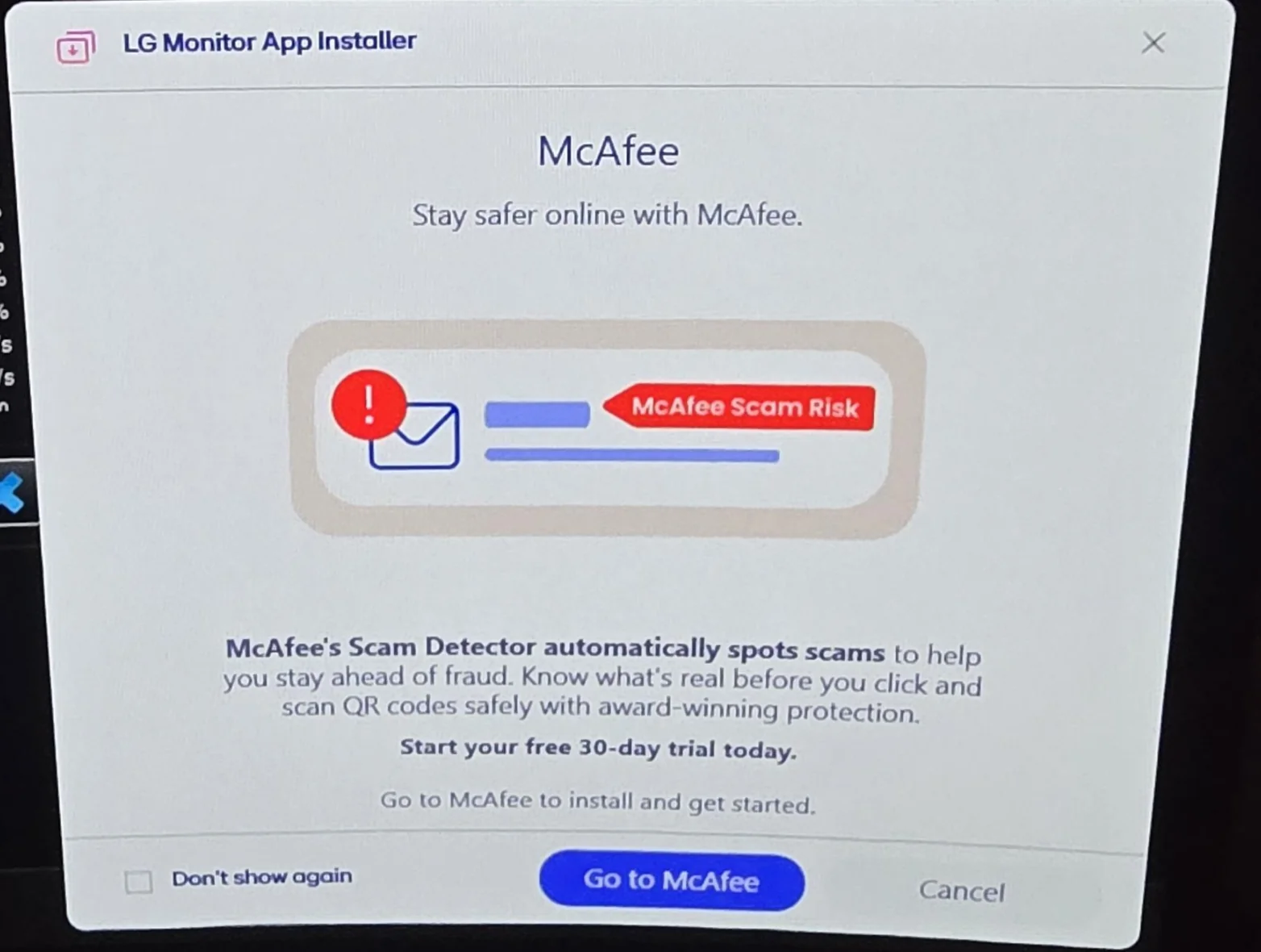 LG monitor adware warning showing unwanted McAfee pop-ups and bloatware installation