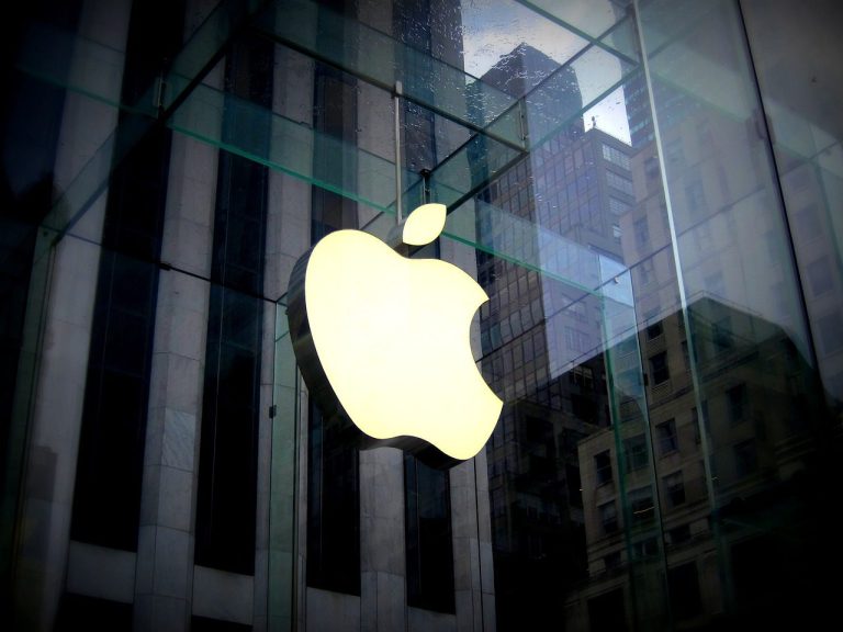 Apple Music AI labels interface displaying artificially generated track warnings